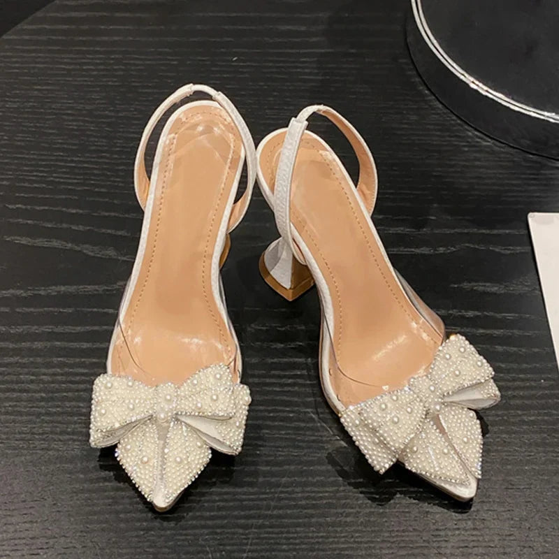 VougeVamp White Pearl Bowknot Pumps – Sexy Pointed Toe Transparent High Heels for Weddings & Proms