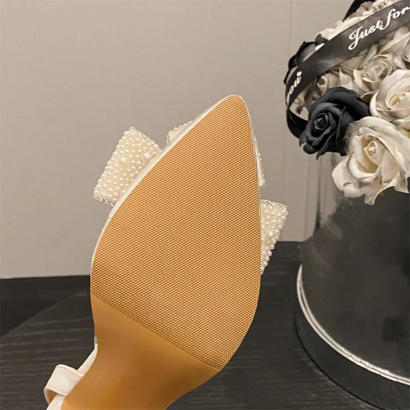 VougeVamp White Pearl Bowknot Pumps – Sexy Pointed Toe Transparent High Heels for Weddings & Proms
