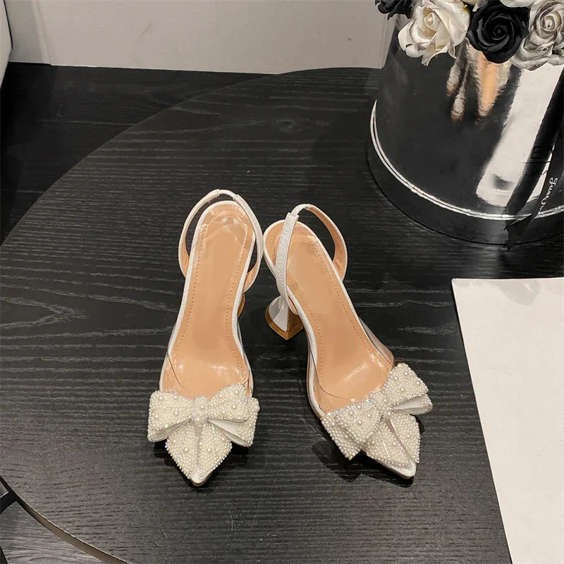 VougeVamp White Pearl Bowknot Pumps – Sexy Pointed Toe Transparent High Heels for Weddings & Proms