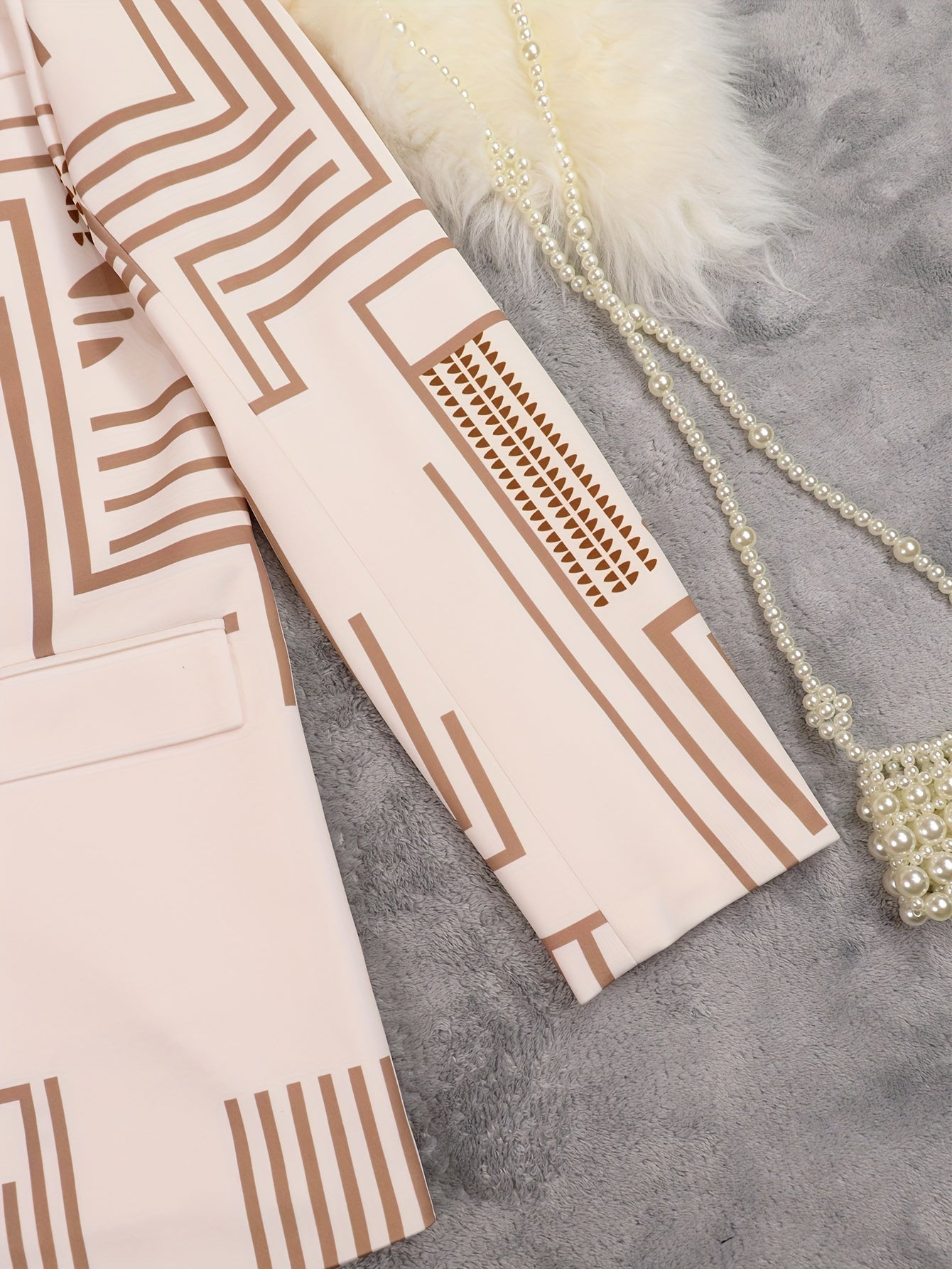 VougeVamp Women's Geometric-Patterned Suit Set – Long Sleeve Lapel Blazer & Trousers with Button Details